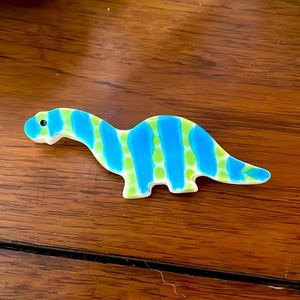 Dinosaur brooch